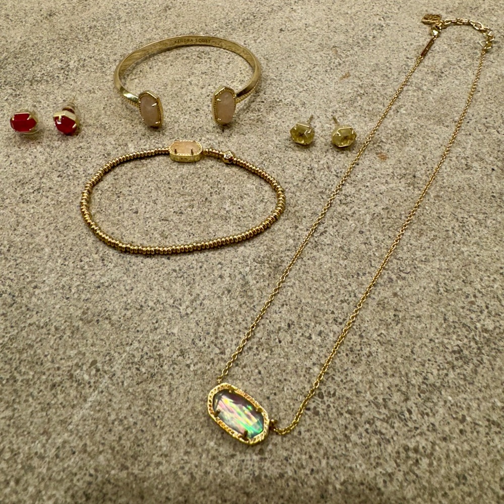 Kendra Scott bracelets, earrings and necklace